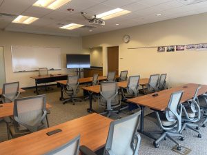 Conference room with tables and chairs in a classroom arrangement
