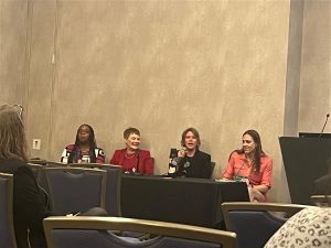 Beth Warner presenting on panel