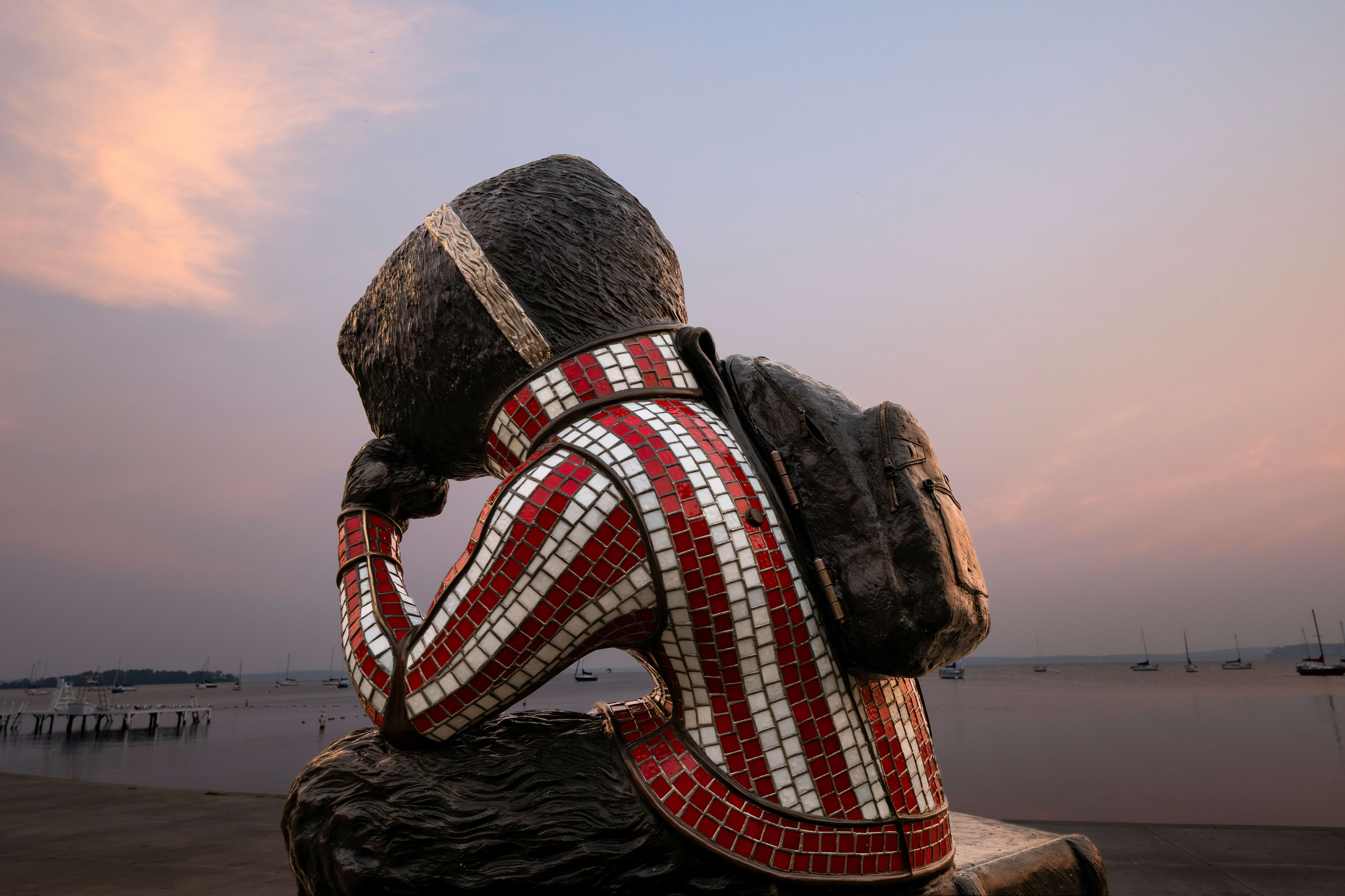 Statue of Bucky Badger looking out at Lake Mendota