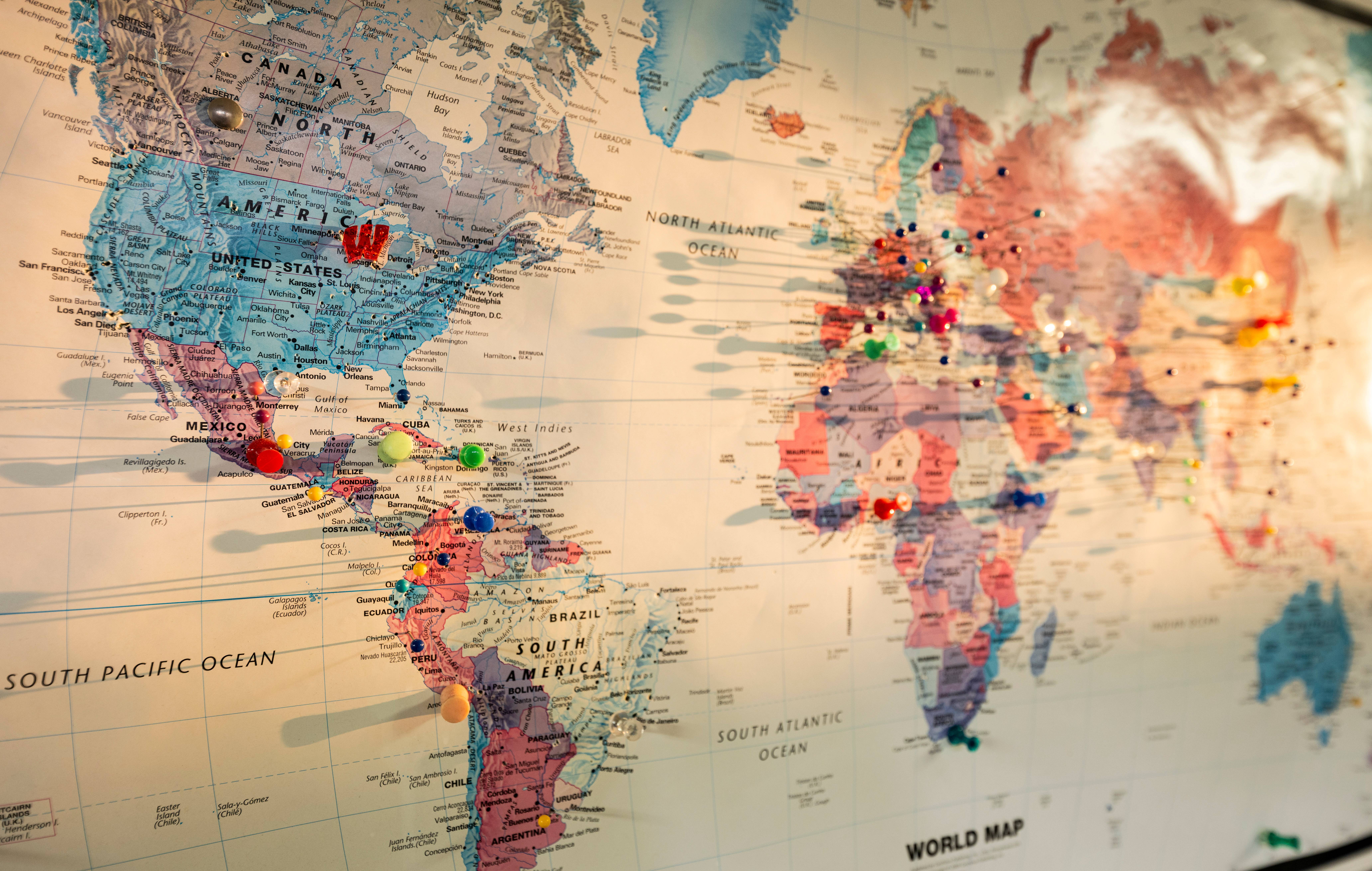 World map with a "W" pin in Madison